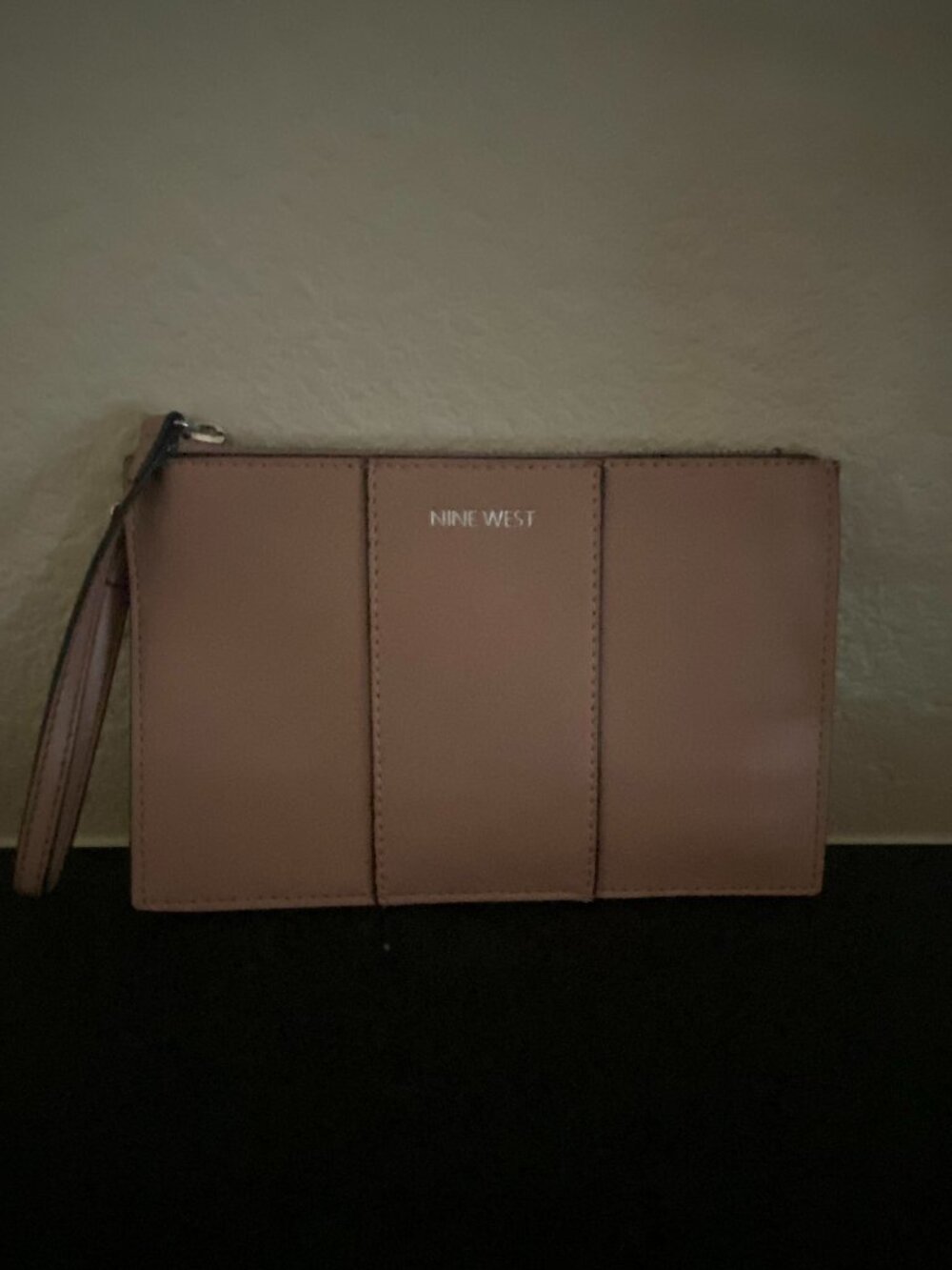 Women's dust pink wristlet